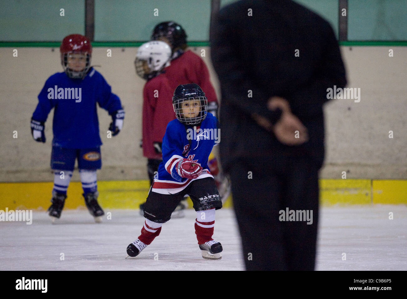 children ice hockey training Stock Photo Alamy