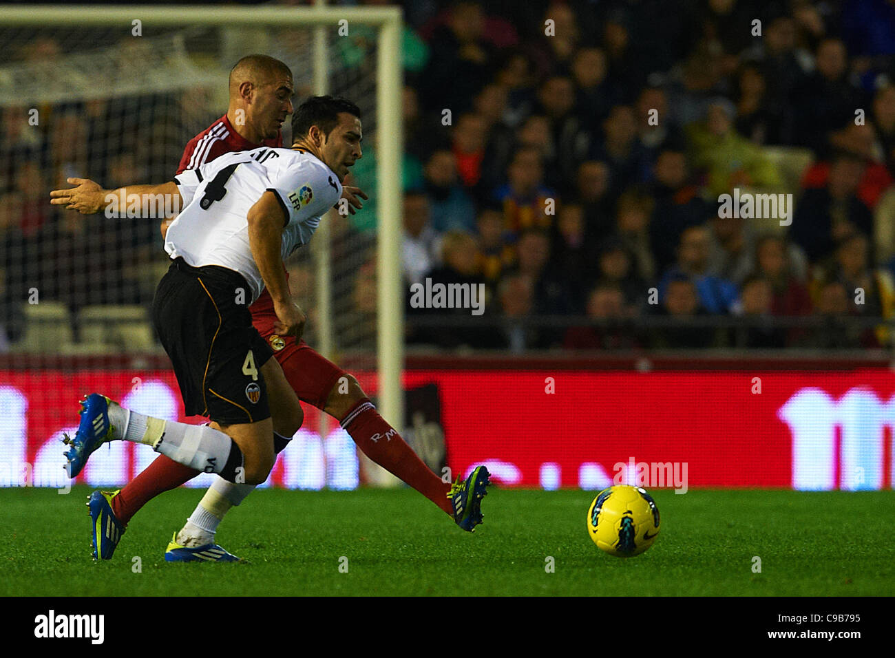 Valencia Rami 19.11.2011 Valencia, Spain. Pepe of Real Madrid clears the ball from ...