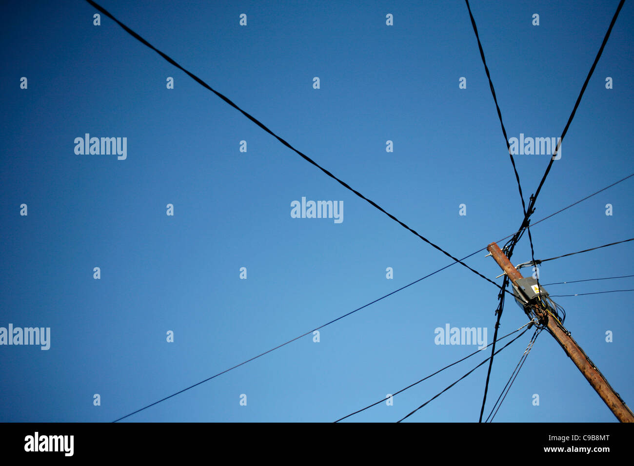 Telephone lines and a blue sky Stock Photo Alamy