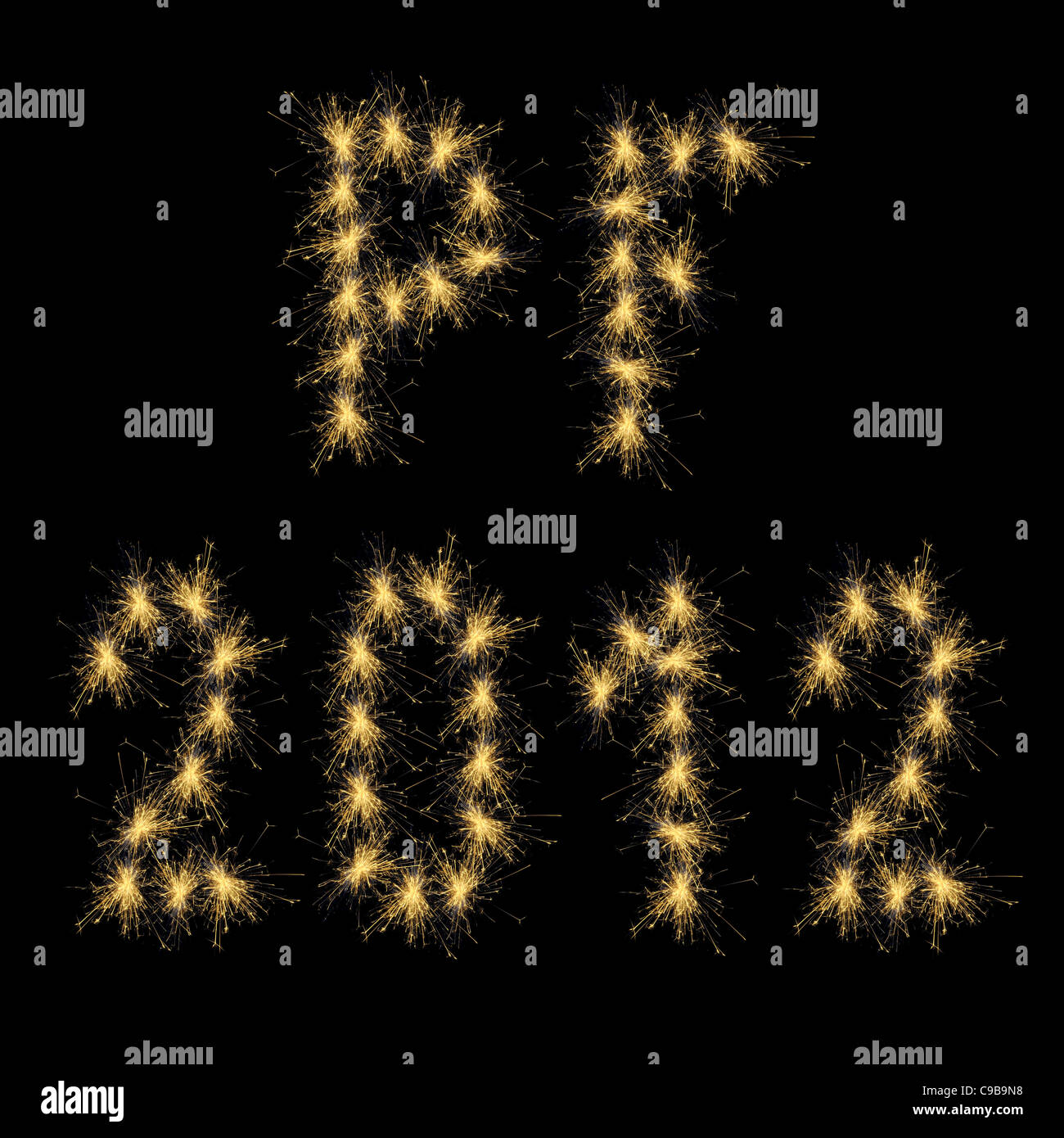 The Season's greetings (PF) with year 2012 shaped by fire sparks on black background. Stock Photo