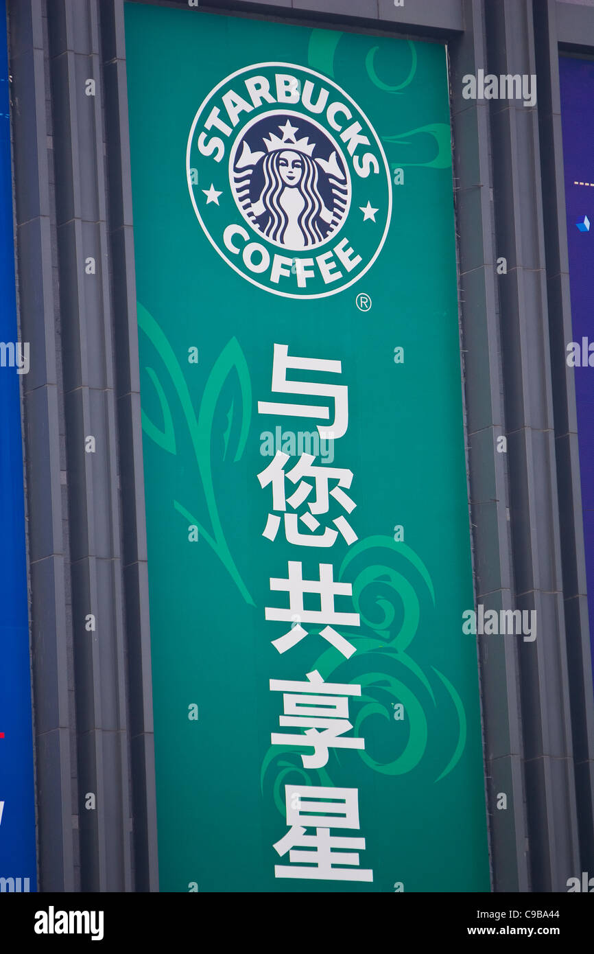 GUANGZHOU, GUANGDONG PROVINCE, CHINA - Starbucks advertising sign in english and chinese, in the city of Guangzhou. Stock Photo