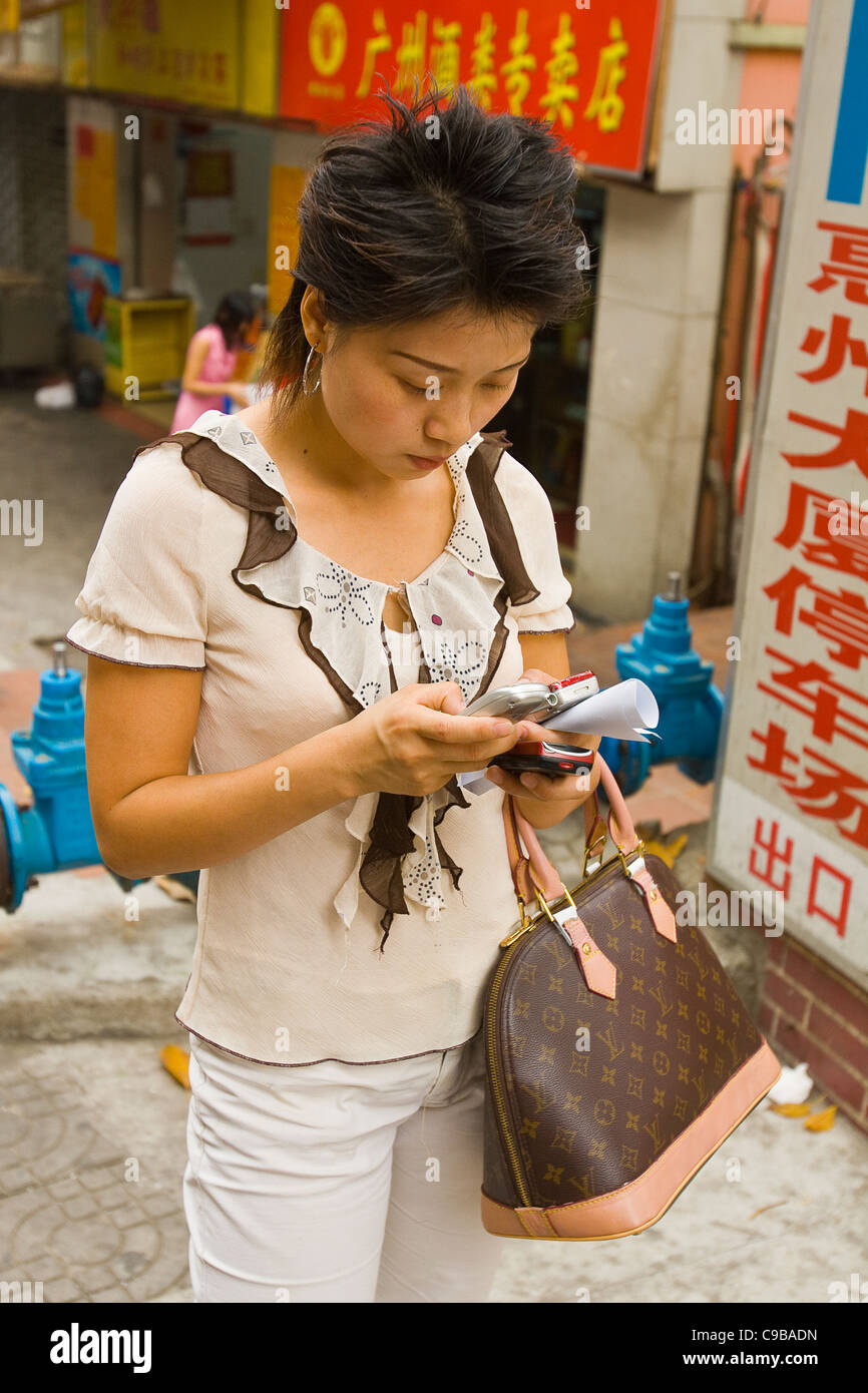 Woman china telephone hi-res stock photography and images - Alamy