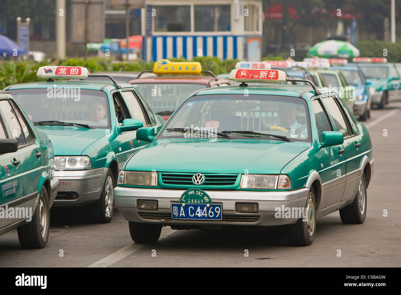 GUANGZHOU, GUANGDONG PROVINCE, CHINA - Taxis line up at train station, in the city of Guangzhou. Stock Photo