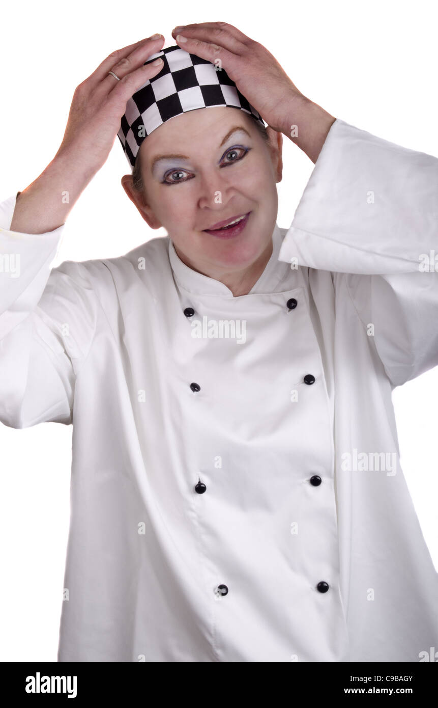 female chef holding both hands over her black and white checkered chef