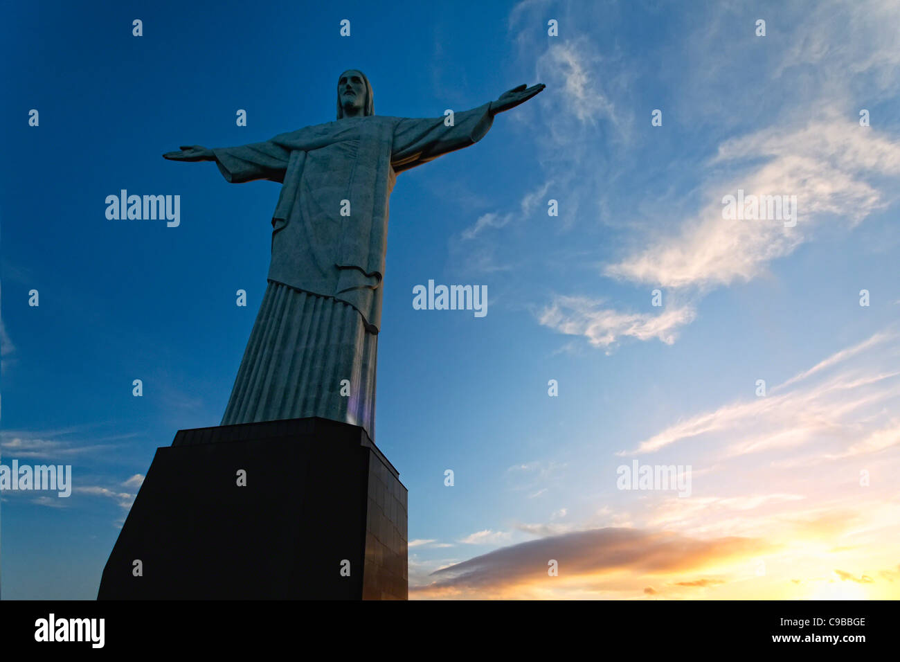 Low Angle View of the Christ the Redeemer Statue at Sunset, Corcovado, Rio de Janeiro, Brazil Stock Photo