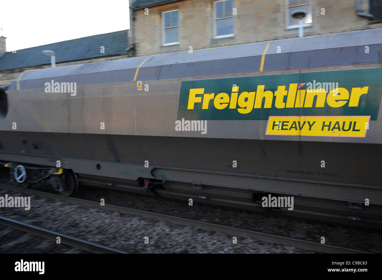 Freightliner freight train speeding Worksop Railway Station Nottinghamshire, England. Uk Stock Photo