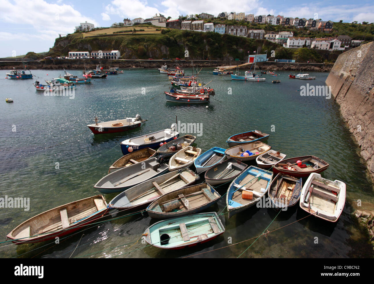 Fishing boats pictured moored in St Austell harbour in Cornwall, United Kingdom. Stock Photo