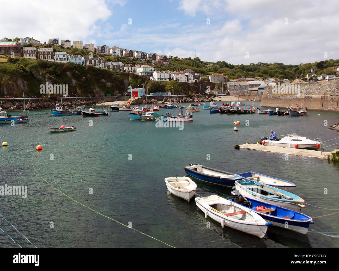 Fishing boats pictured moored in St Austell harbour in Cornwall, United Kingdom. Stock Photo