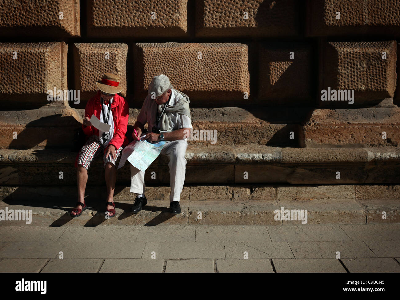 Elderly tourists pictured at the Alhambra in Granada, Andalucia, Spain Stock Photo