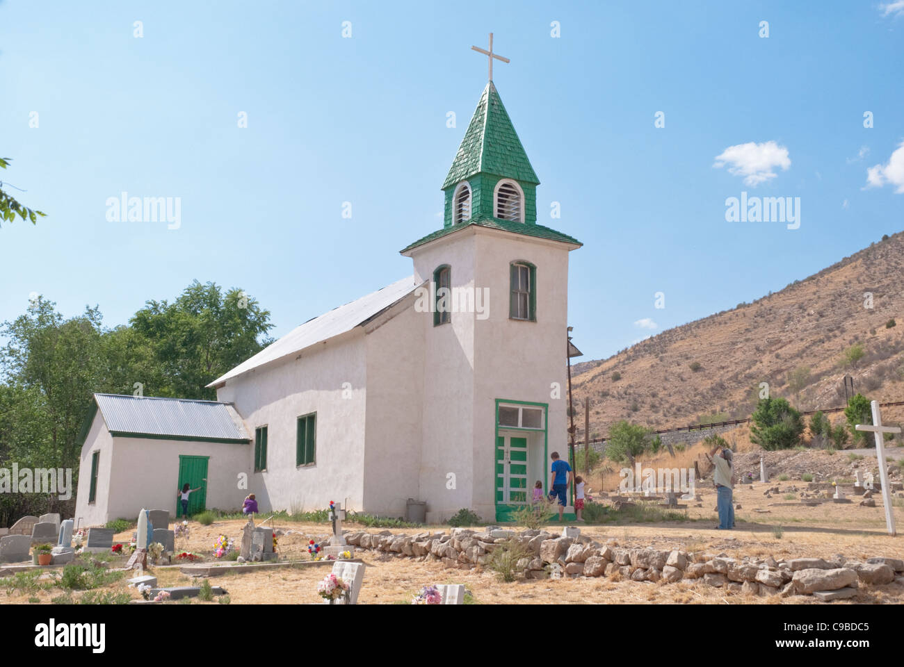The church at San Patricio with it's green steeple sits in the beautiful Hondo Valley in southern New Mexico Stock Photo