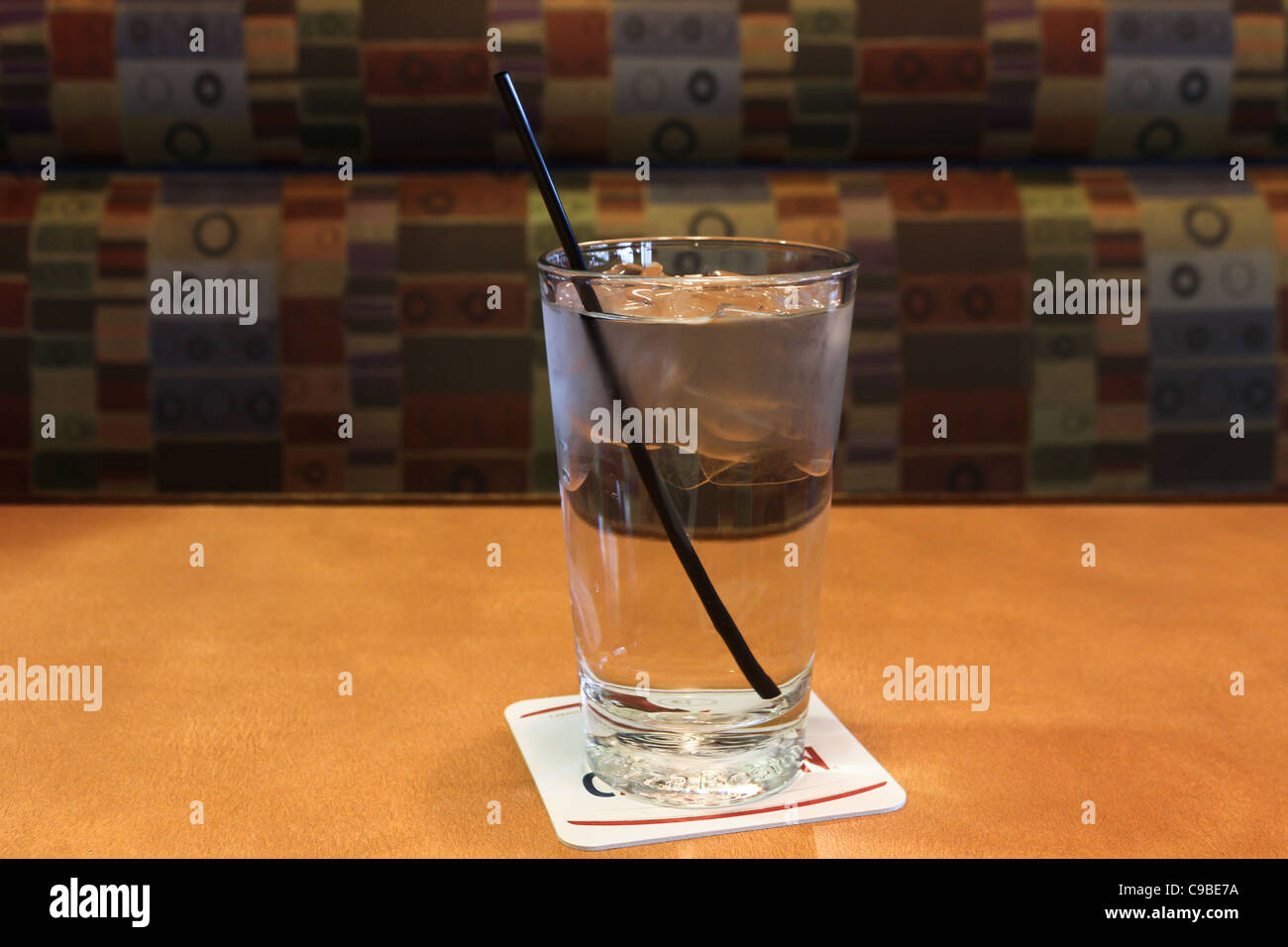 black strew glass water ice restaurant table Stock Photo
