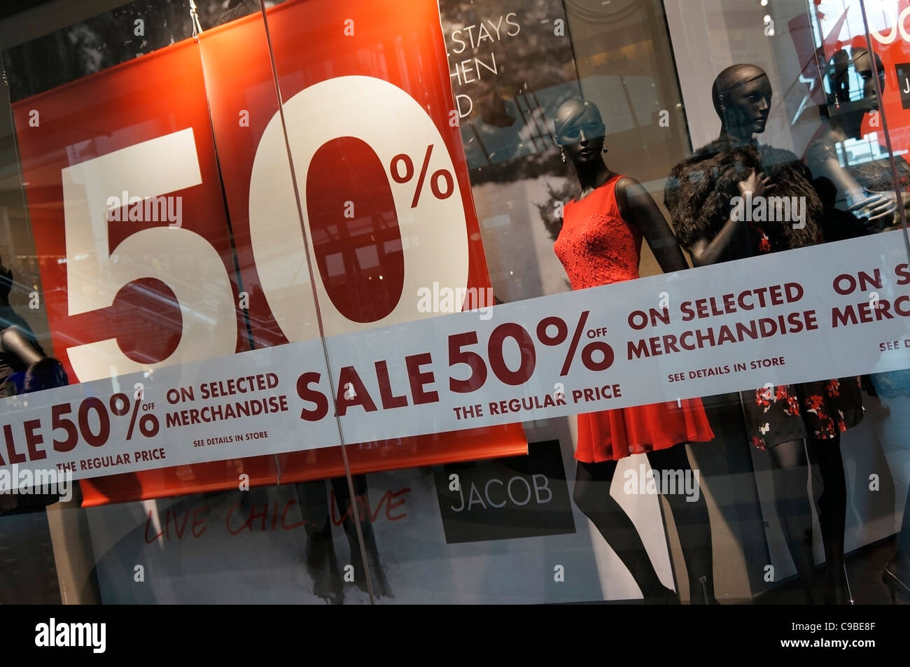 Sale on Merchandise sign in shop window, Toronto Eaton Centre Stock Photo