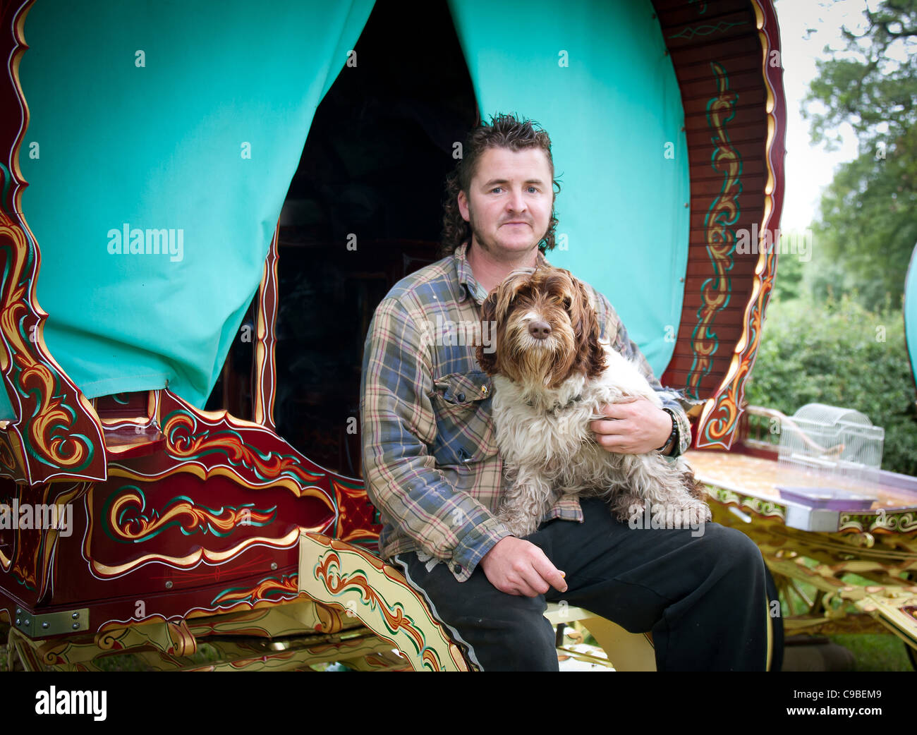 Gypsy traveler with Romany caravan, Cheshire, UK Stock Photo