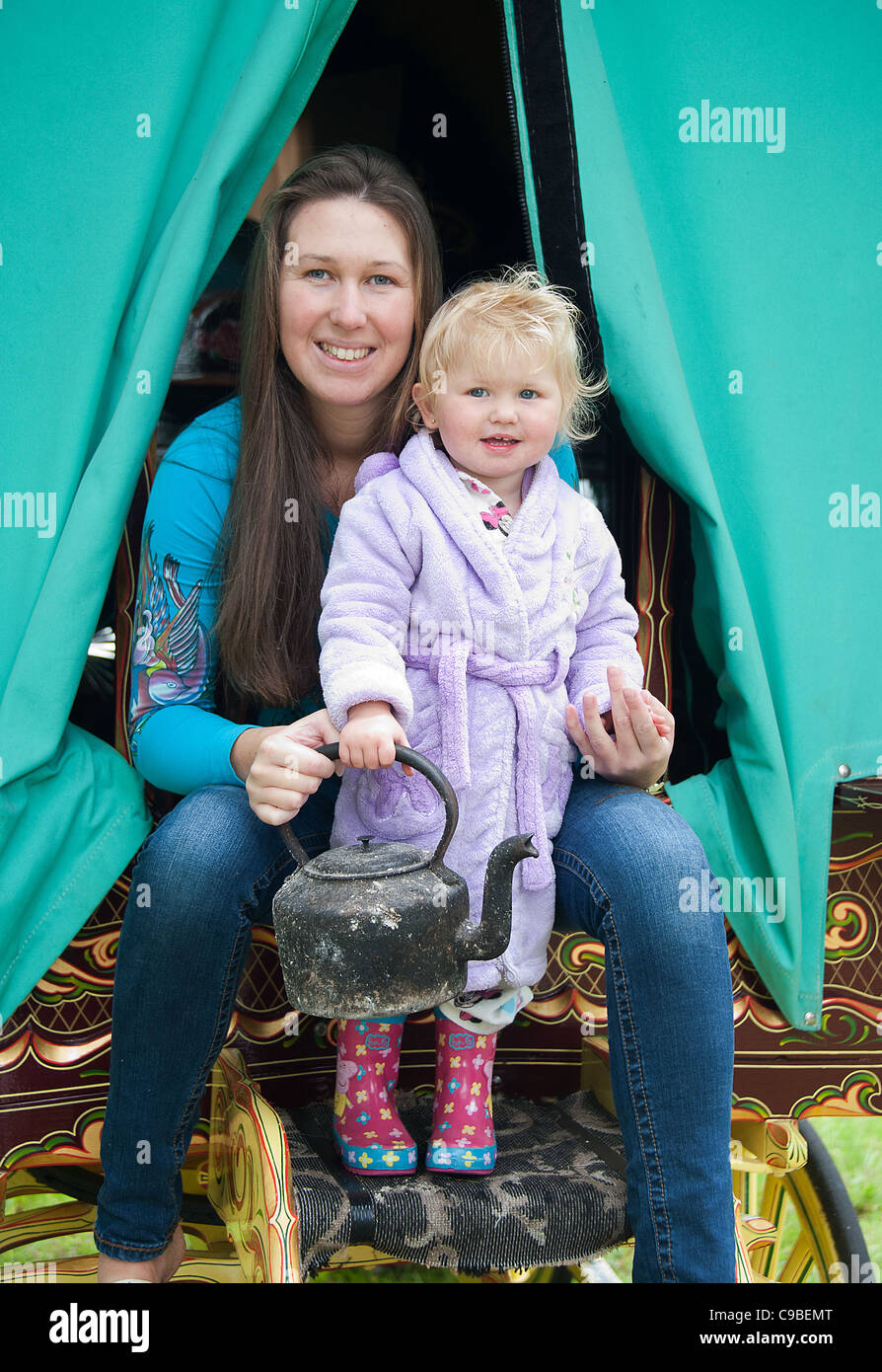 Traveler Mother and daughter in Romany caravan Stock Photo