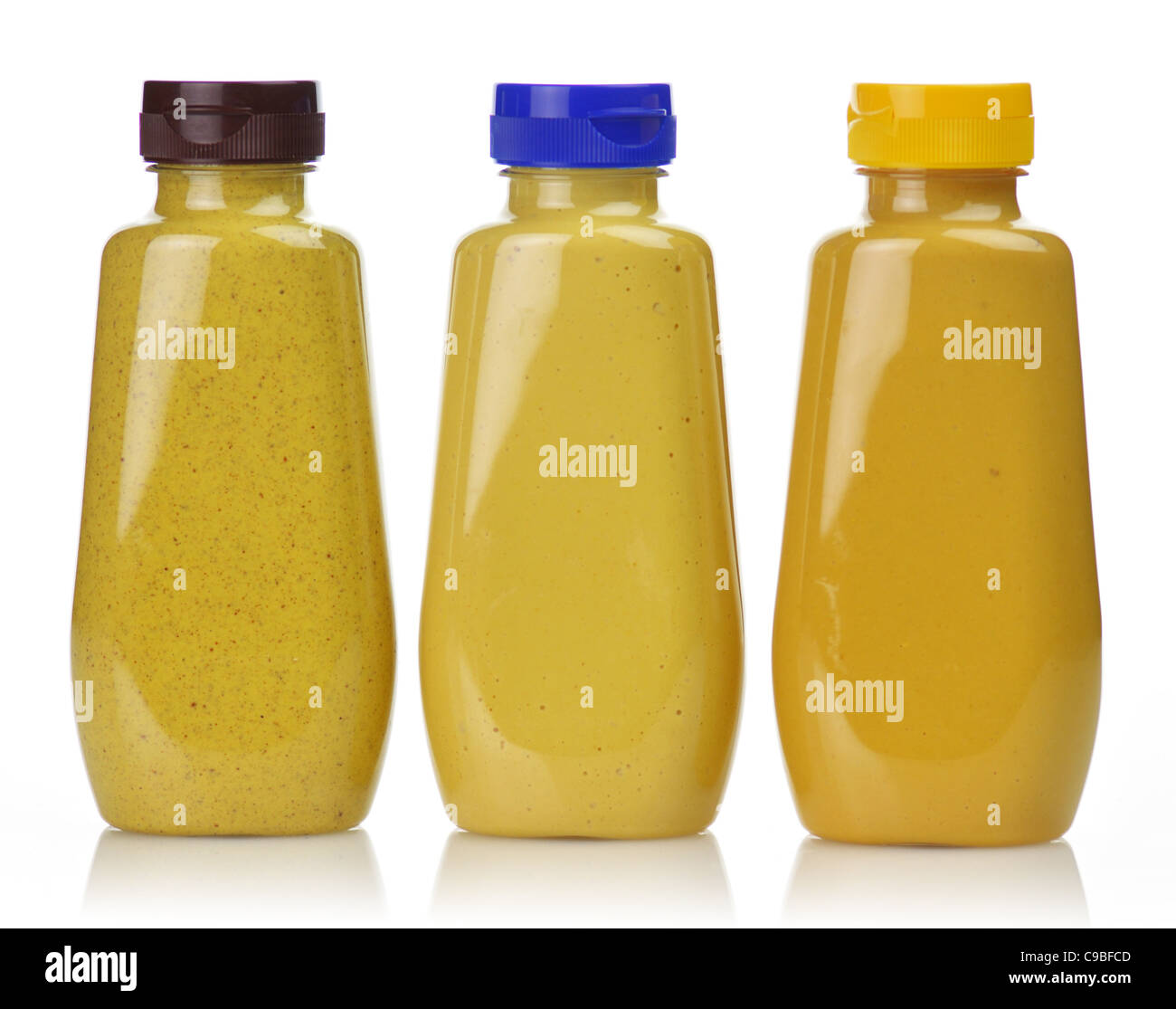 plastic bottles of honey ,dijon and spicy brown mustard Stock Photo Alamy