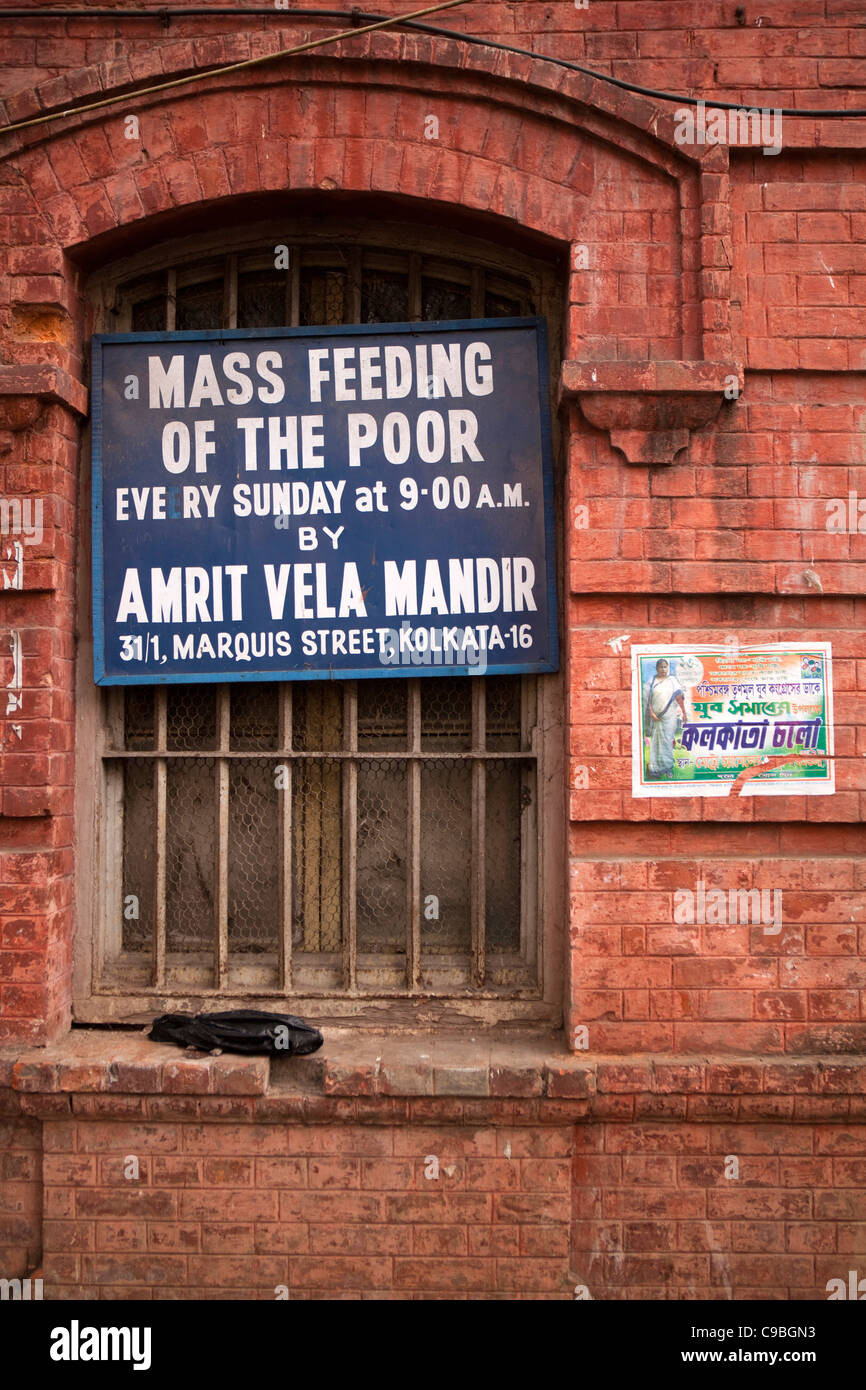 India, West Bengal, Kolkata, Chowringhee, Suddar Street, notice announcing weekly mass feeding of the poor Stock Photo