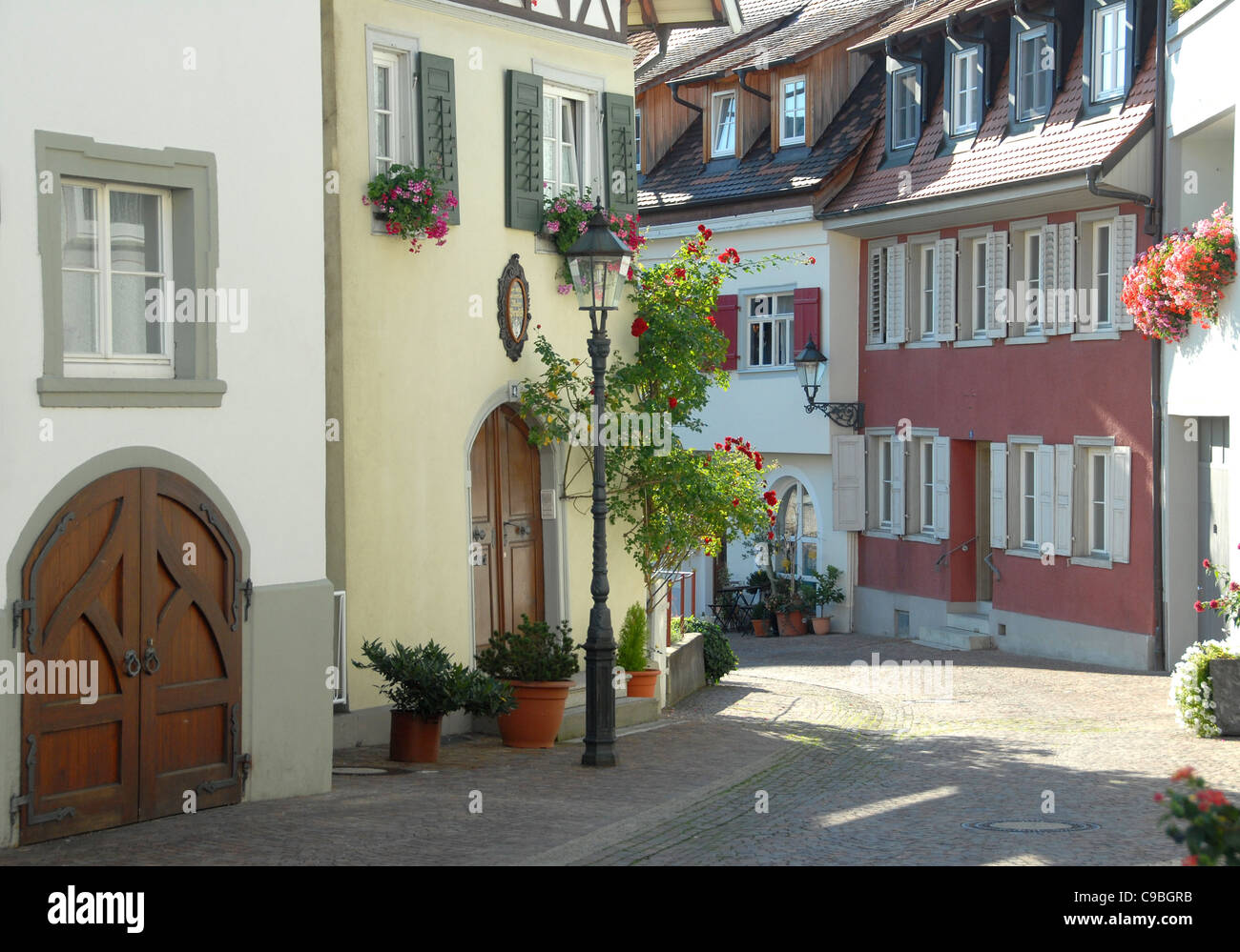 Ulrichstraße at Markdorf in Upper Swabia with traditional German house facades Stock Photo