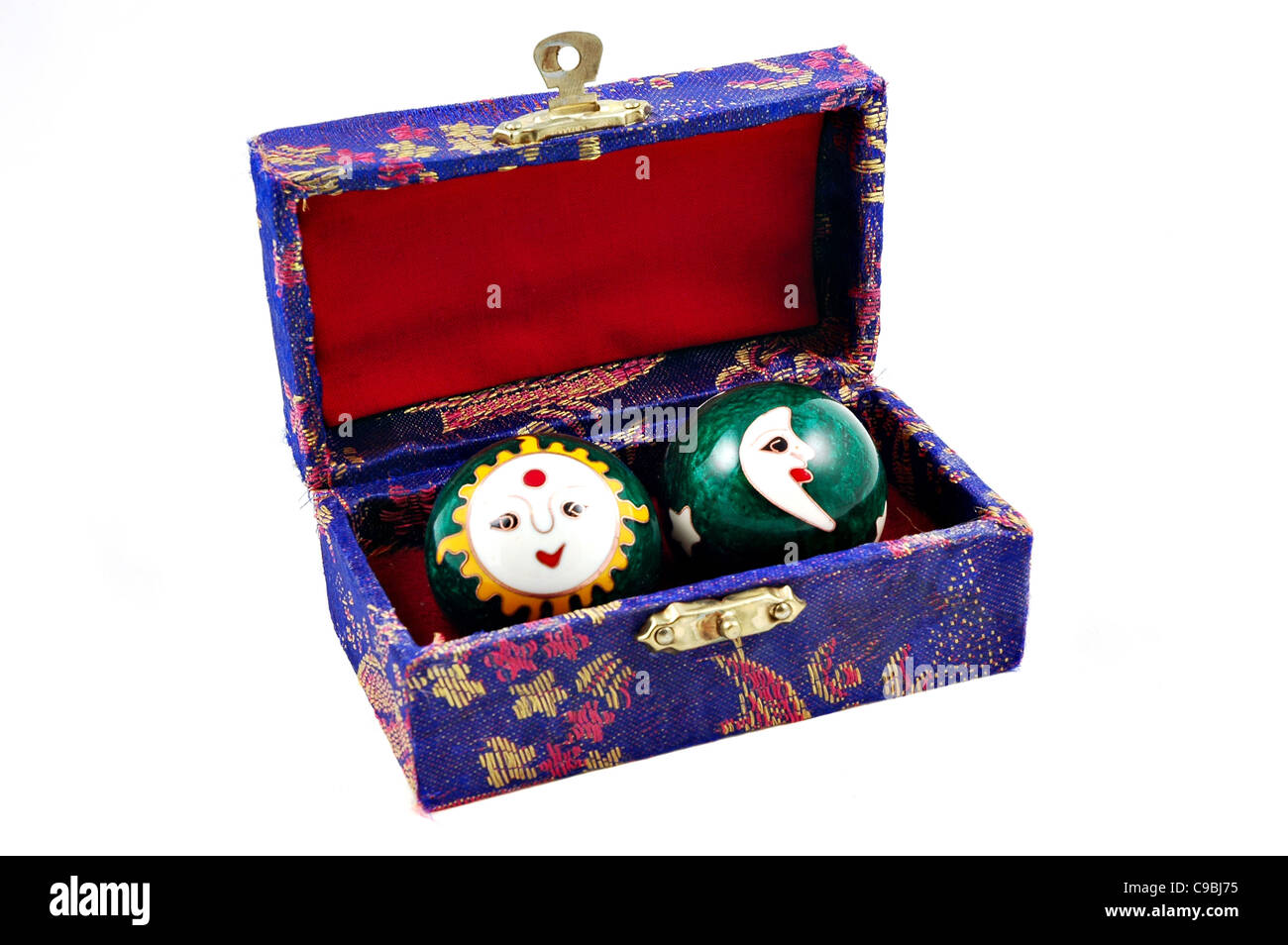 Two therapy balls with a sun and moon design in a gift box Stock Photo
