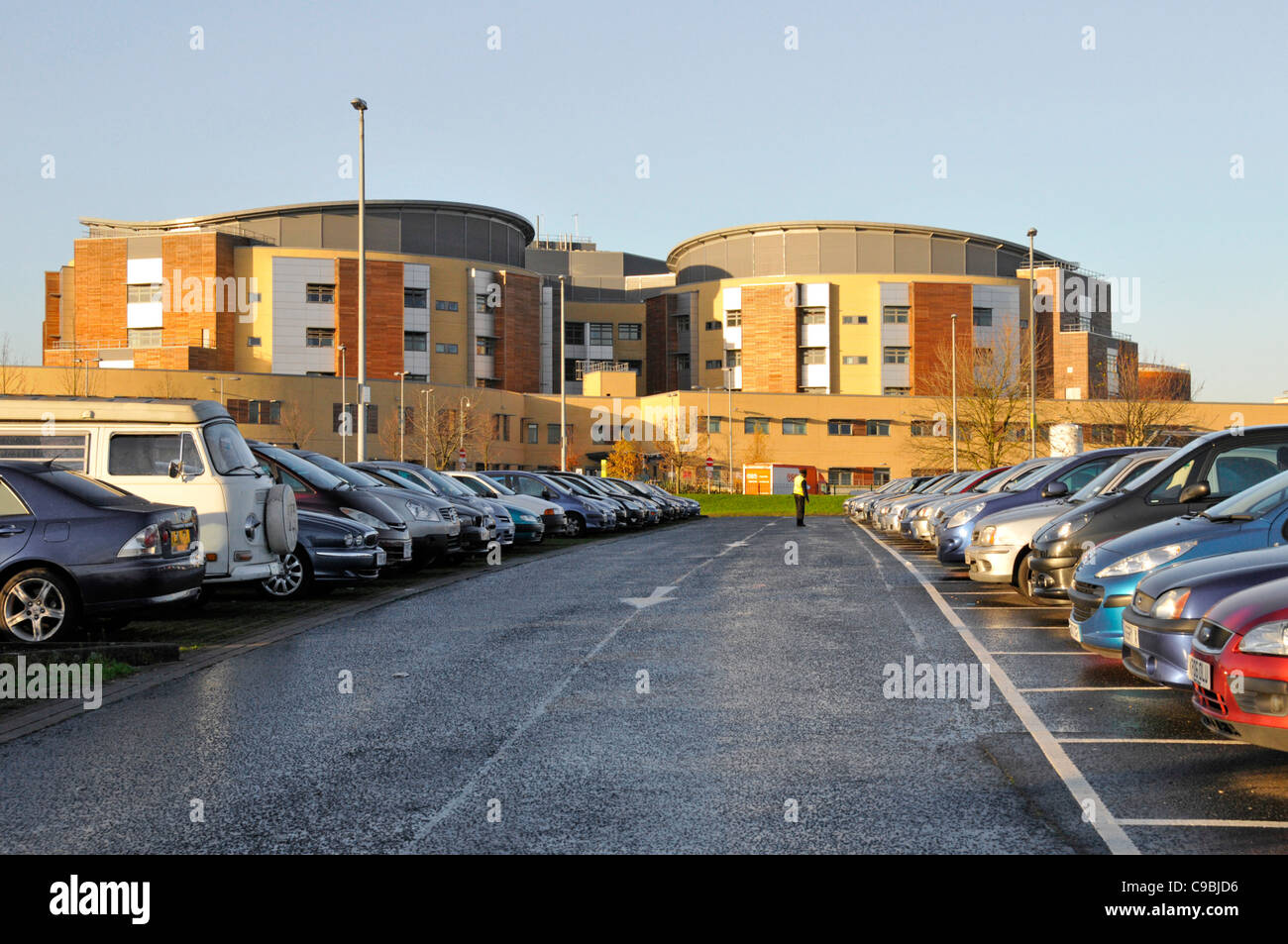 National Health Service hospital car park at Queens Hospital Romford exterior NHS hospital healthcare medical centre building created under PFI in UK Stock Photo