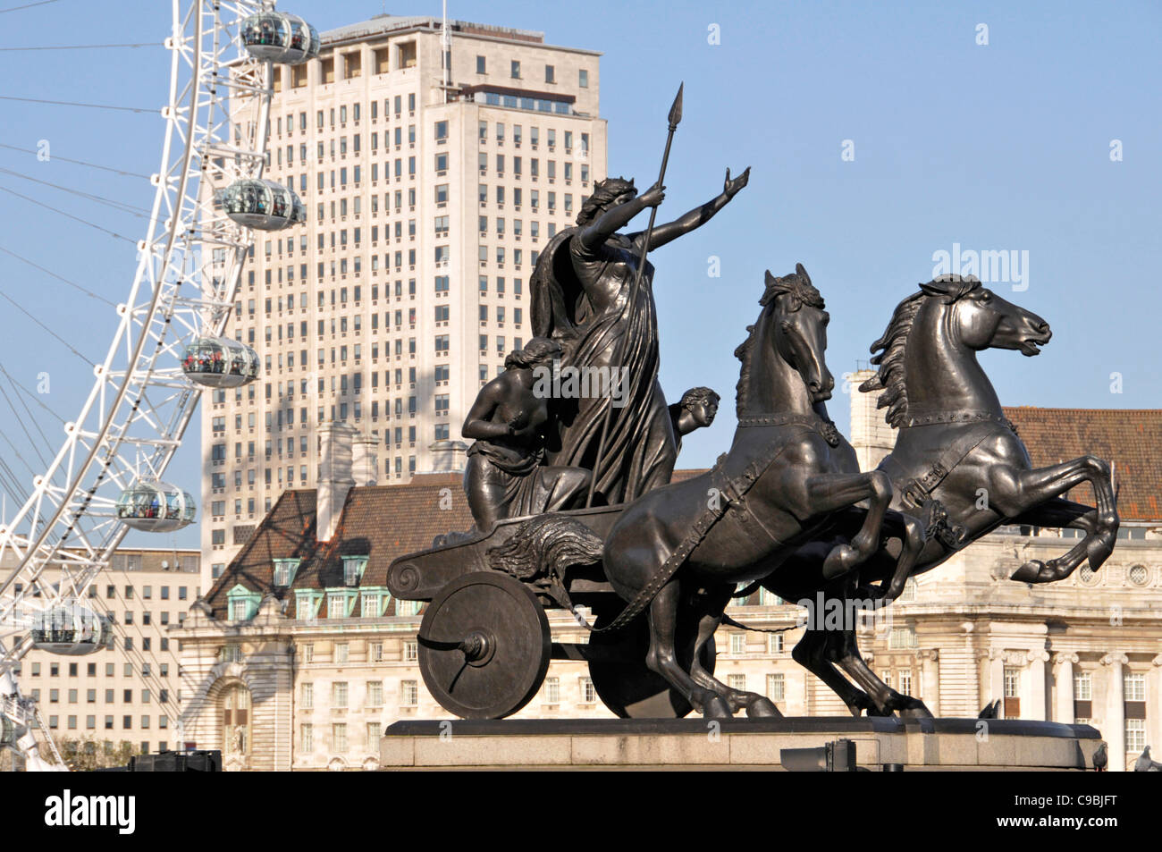 Statue of Boudica with the London Eye and the Shell building  beyond Stock Photo