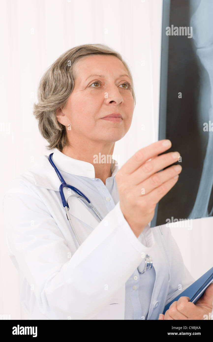 Senior doctor looking x ray hi-res stock photography and images - Alamy