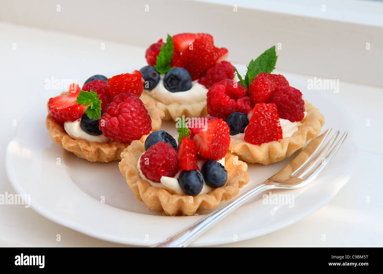 FRESH FRUIT TARTLETS Stock Photo Alamy