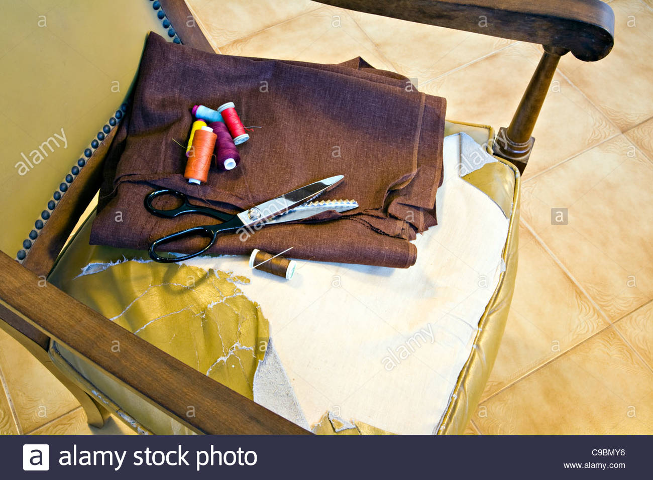 Worn Out Chair Seat With Materials For Repair Stock Photo
