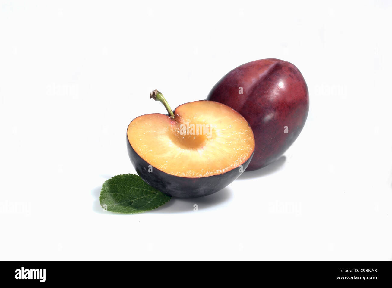 Plums on white background Stock Photo