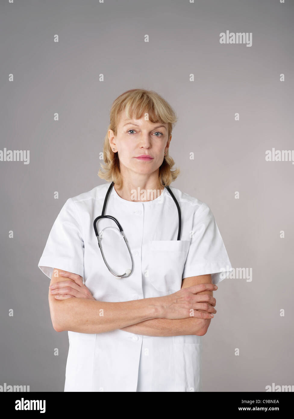 Portrait of mature female doctor Stock Photo - Alamy