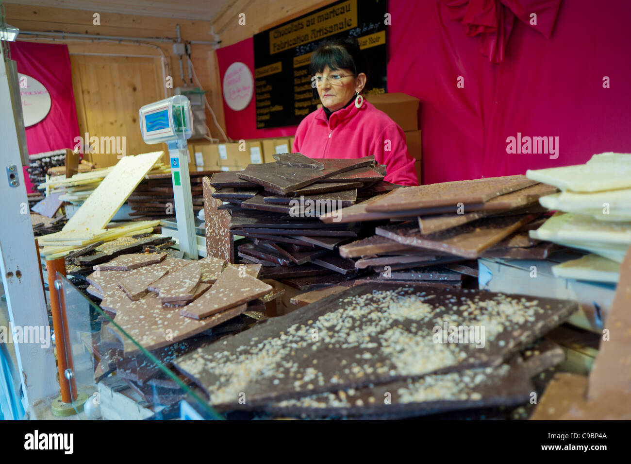 Female clerk working chocolate shop hi-res stock photography and images