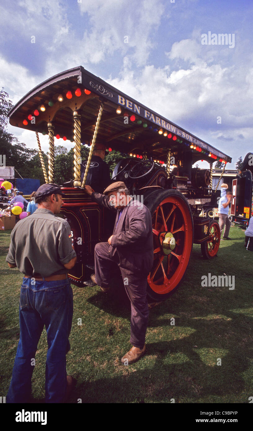 traction engine drivers talking at rally at Harewood House Yorkshire UK Stock Photo