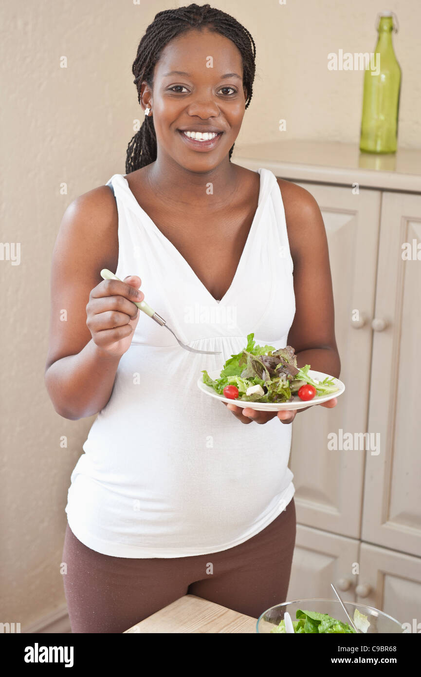 Pregnant woman eating salad, Johannesburg, Gauteng Province, South
