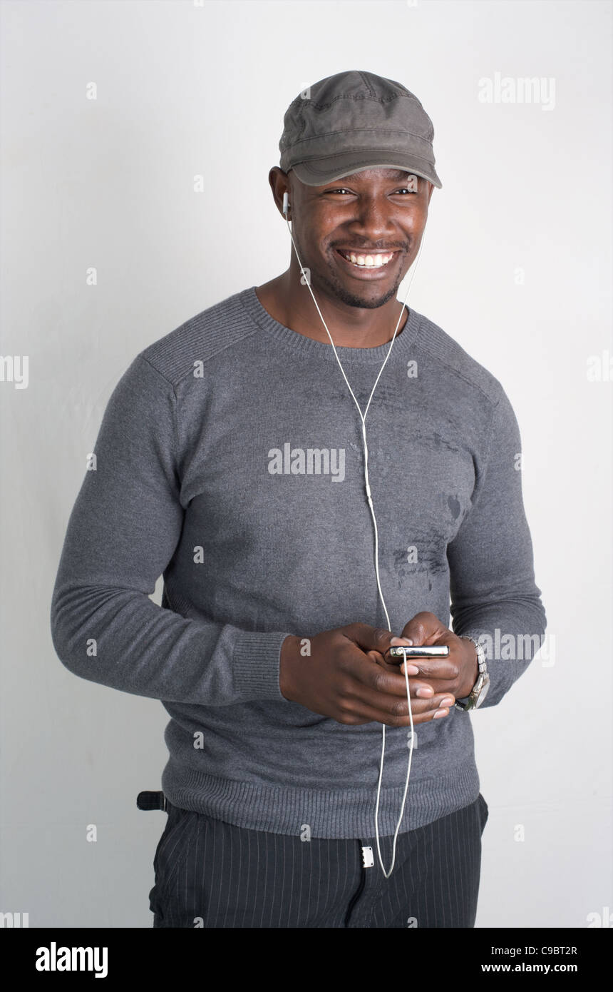 Trendy young Kenyan man enjoying music, Nairobi, Kenya Stock Photo Alamy