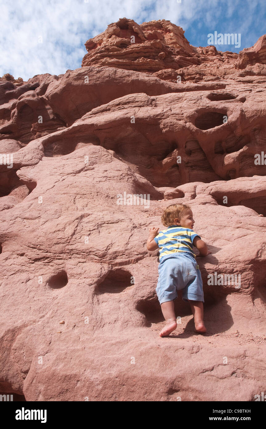 baby climbing mountain success