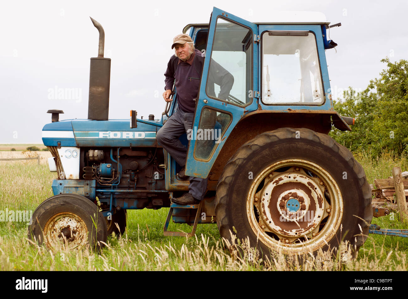 Ford tractor and driver Stock Photo