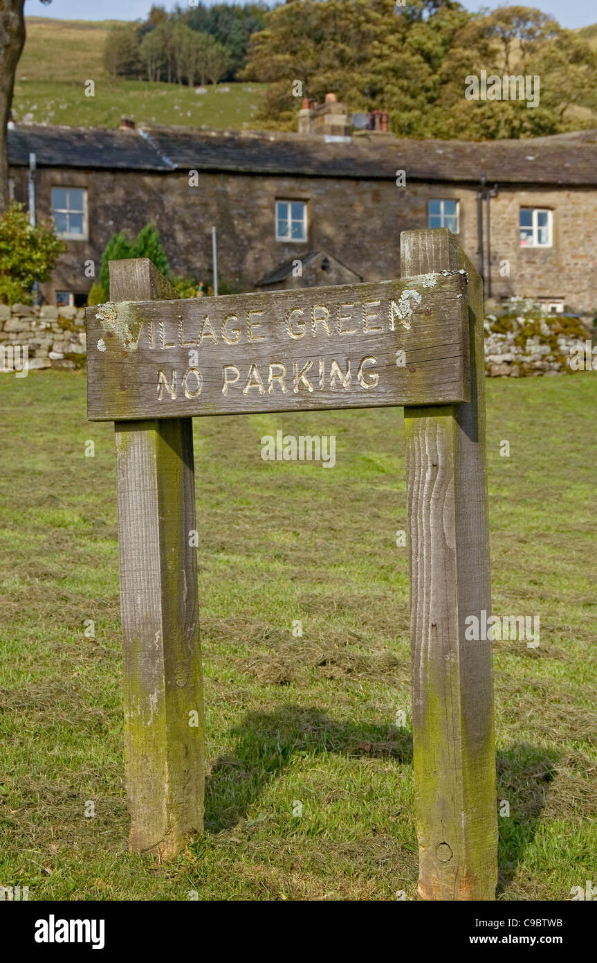 Close up of no parking on village green sign Halton Gill Littondale North Yorkshire England UK United Kingdom GB Great Britain Stock Photo