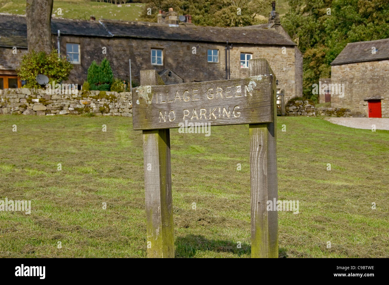 Close up of no parking on village green sign Halton Gill Littondale North Yorkshire Dales National Park England UK United Kingdom GB Great Britain Stock Photo