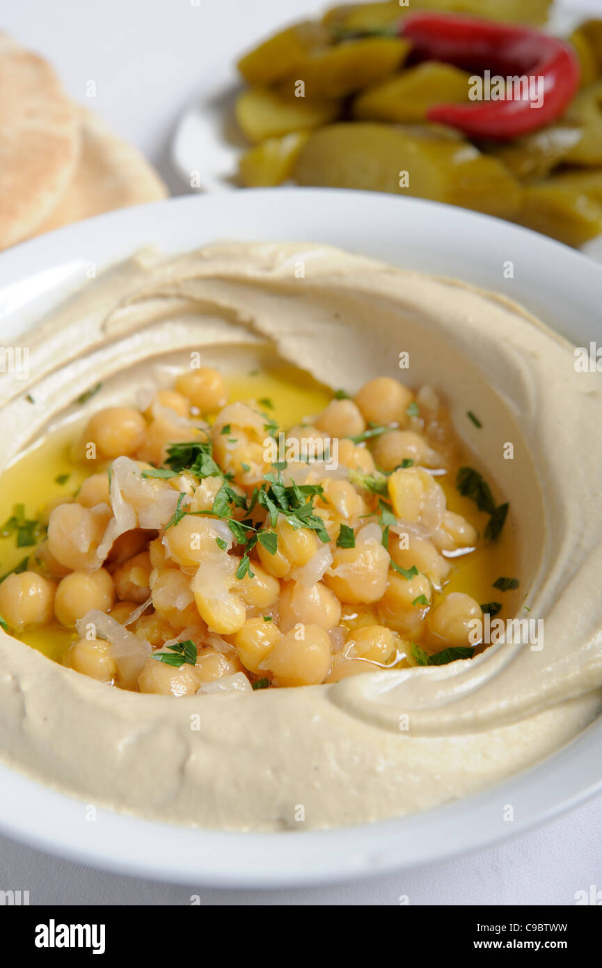 Hummus. A Levantine Arab dip or spread made from cooked, mashed