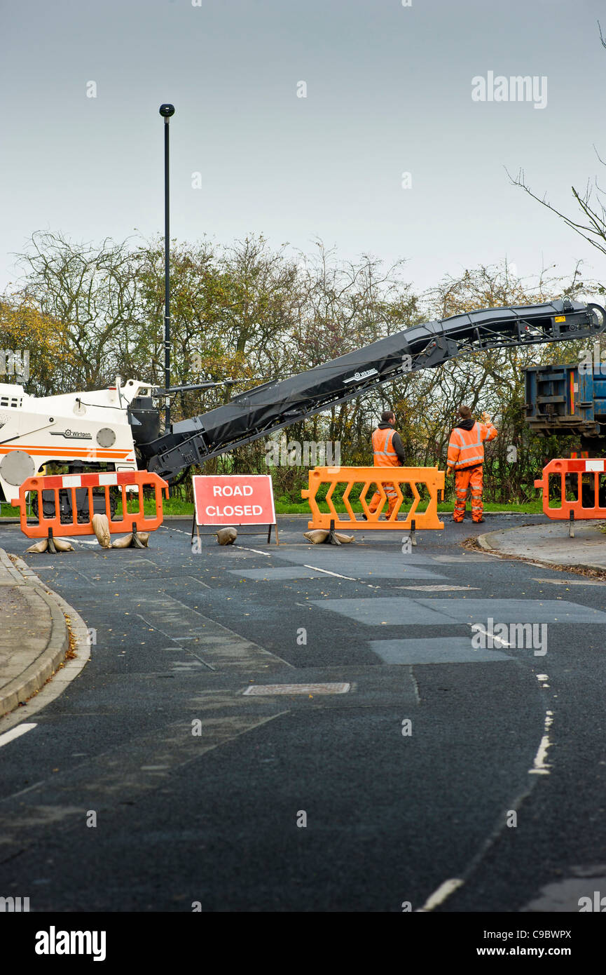 Road closed on suburban street due to road re-surfacing Stock Photo