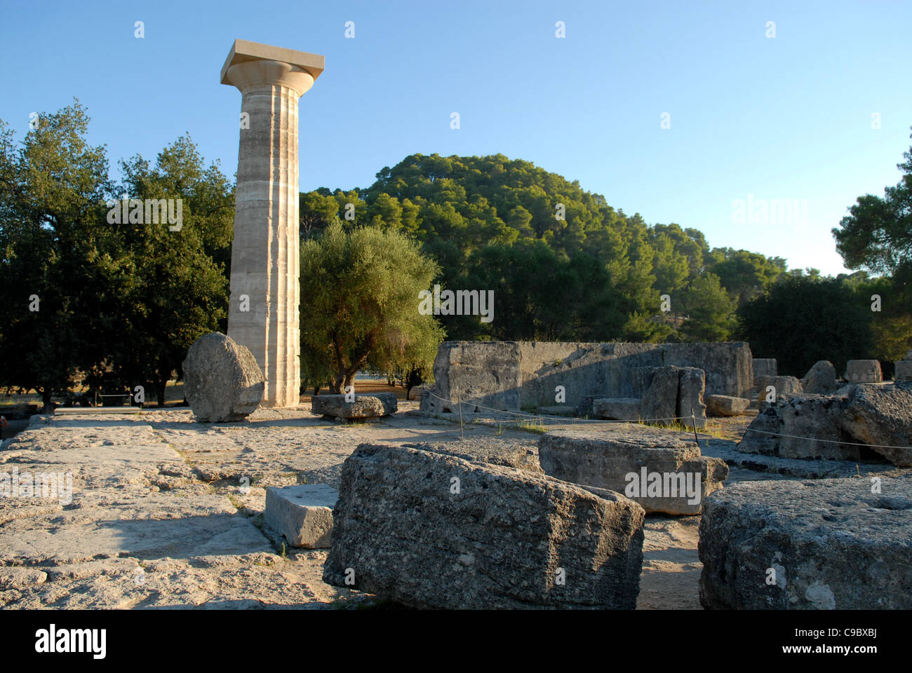 Olympia , Greece in Early Morning before the Crowds with Doric Column Stock Photo