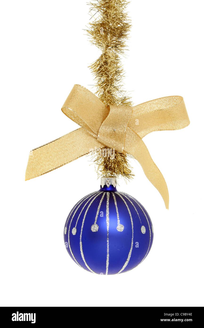Blue and silver Christmas bauble hanging from tinsel with a gold ribbon
