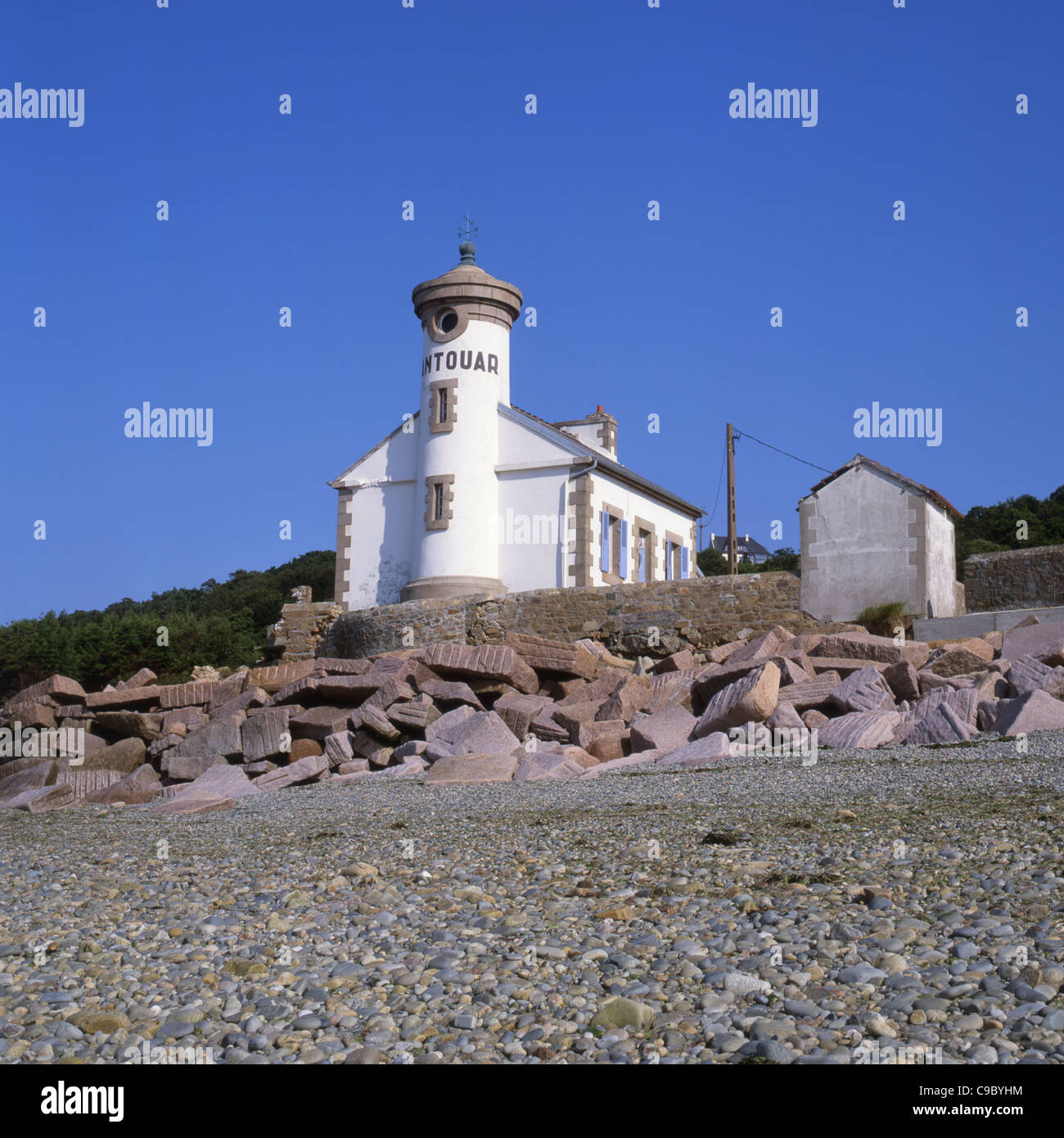 Old lighthouse on beach at Nantouar. Port L'Epine. Brittany. France Stock Photo