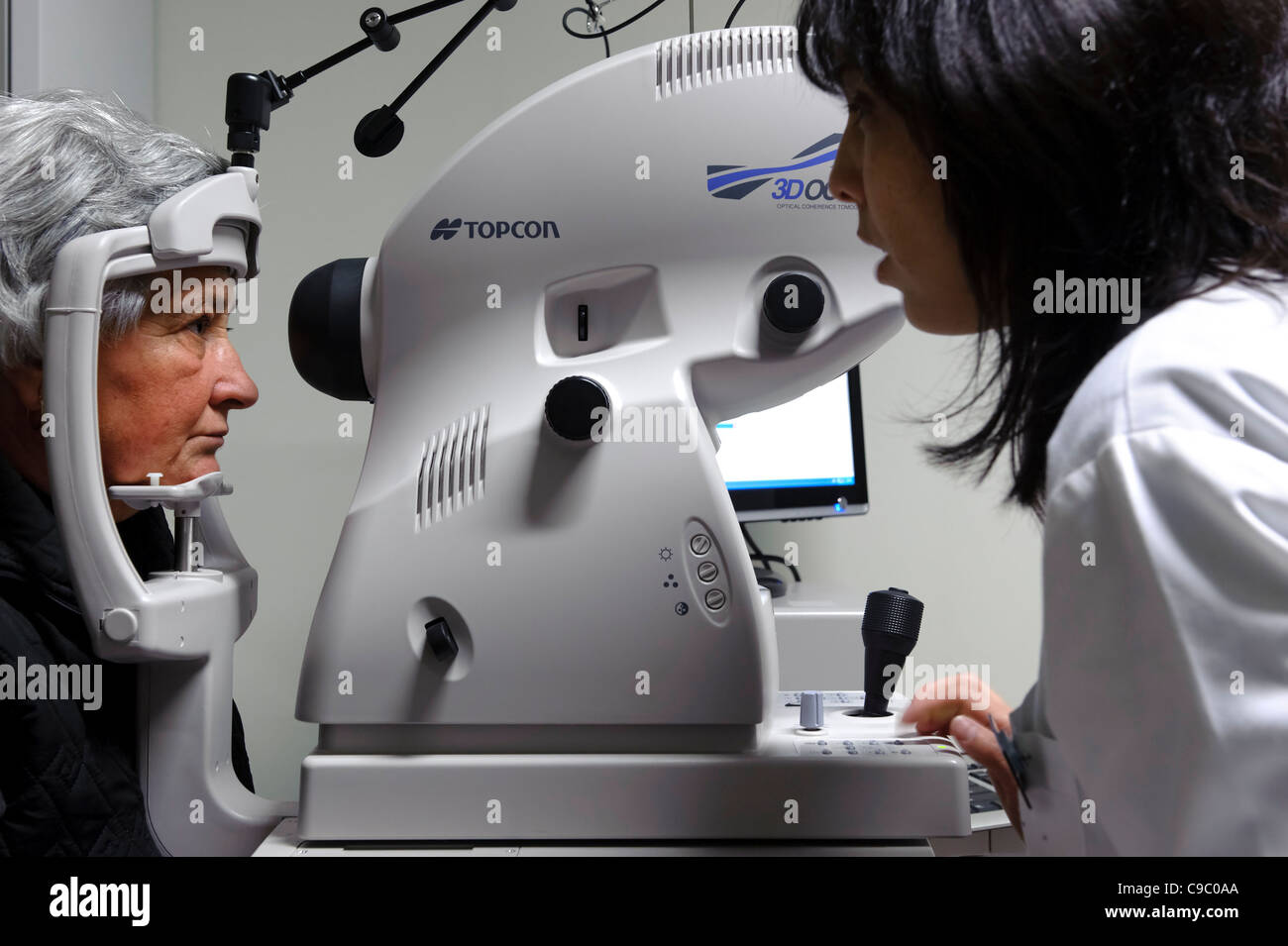 Optical coherence tomography eye exam using a Topcon OCT1000 medical