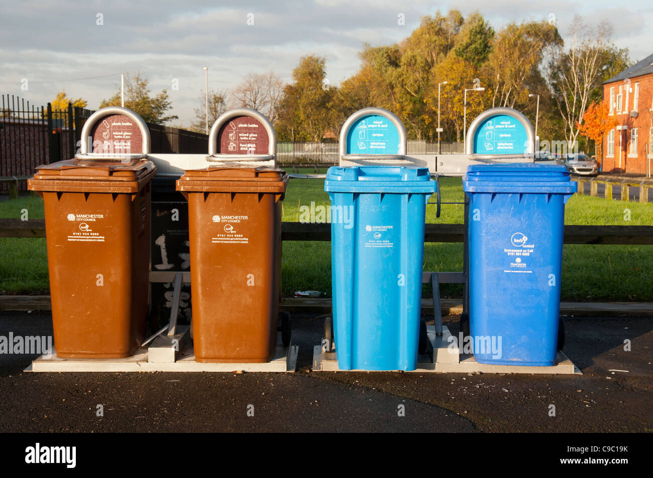 Public recycling bins on a street in Openshaw, Manchester, England, UK Stock Photo