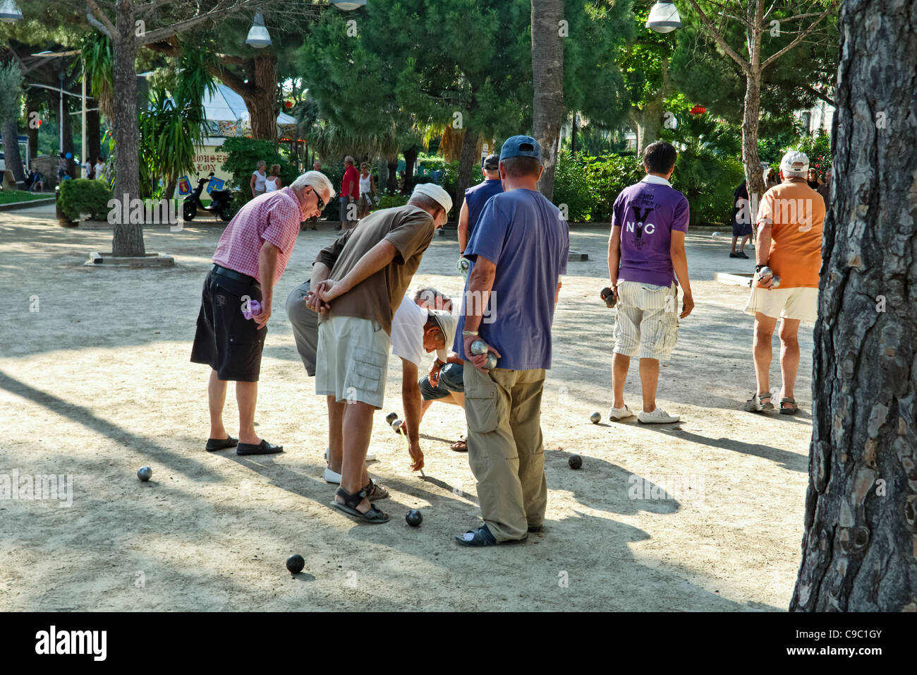 Men playing petanque in Saint Maxime, south france, French Reviera Stock Photo