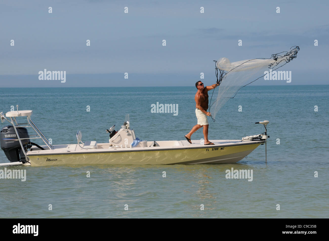 Fisherman Throwing Fish Net High Resolution Stock Photography and