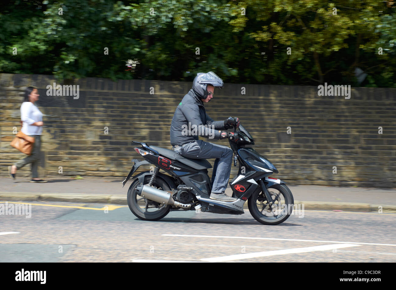 Moped rider in Lockwood, Huddersfield Stock Photo Alamy