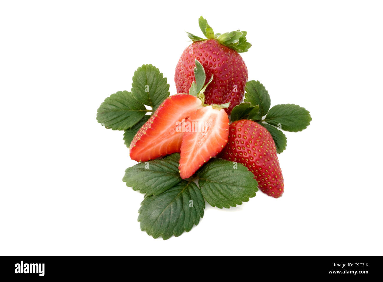 Strawberries on green leaves isolated on white background Stock Photo ...