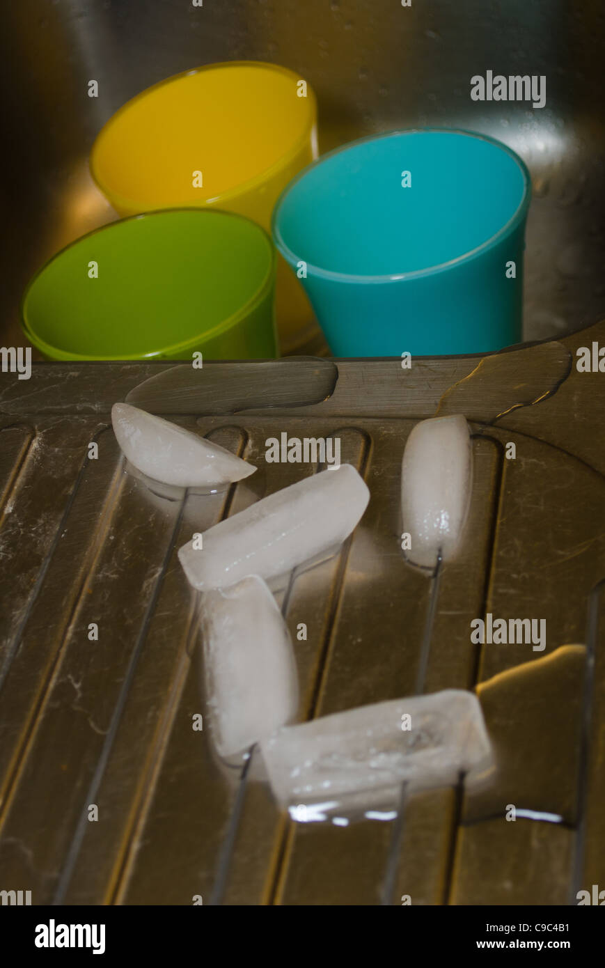 Ice cups and sink Stock Photo Alamy