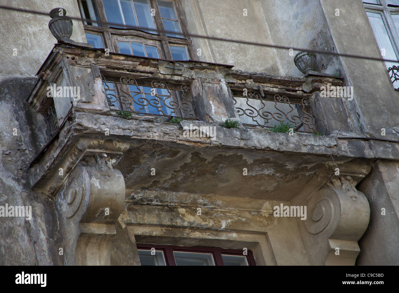 Decaying Balcony over Door in Old City and Jewish Area, L'viv, Ukraine Stock Photo
